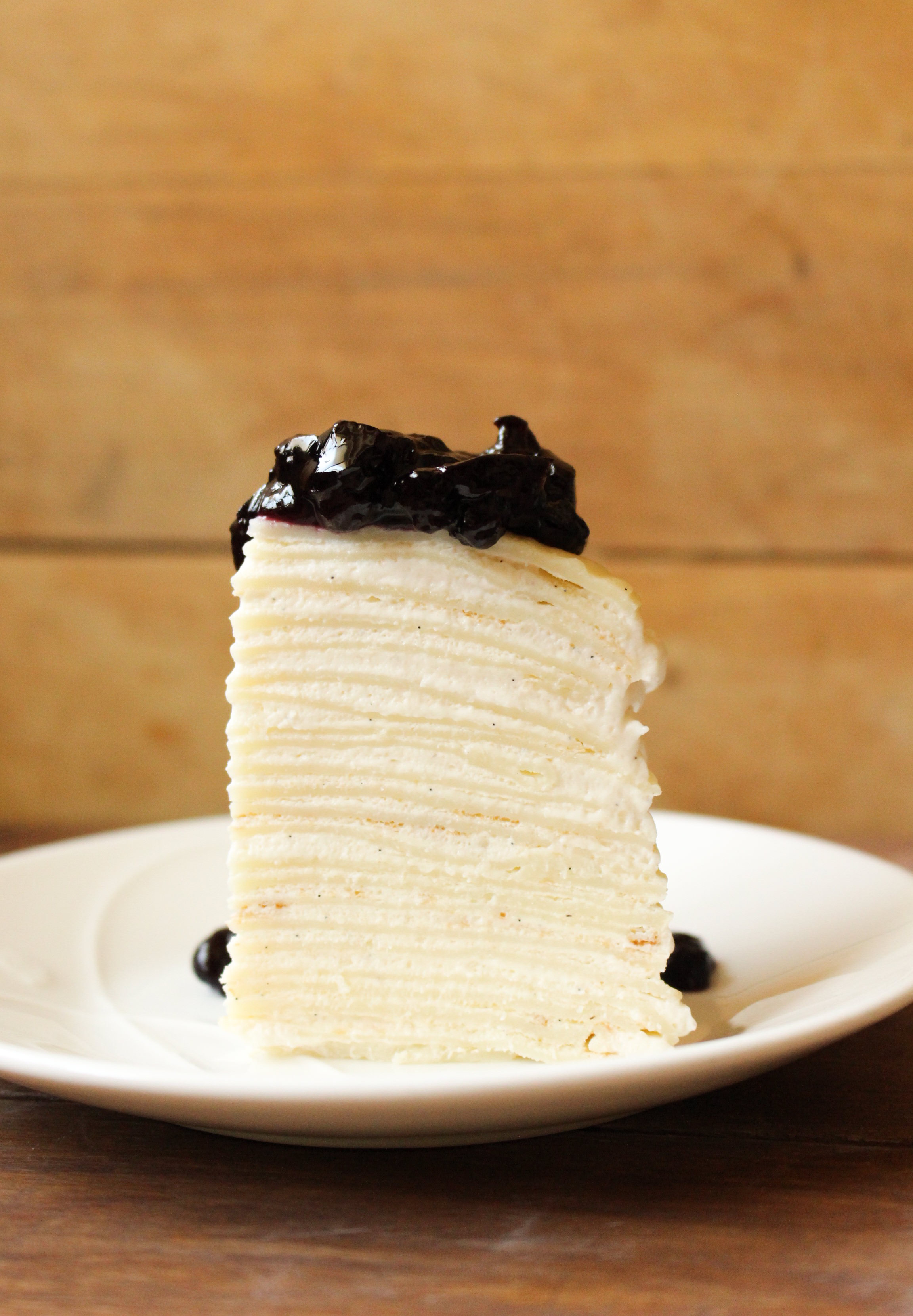 Foodie Bucket List Vanilla Mille Crêpe Cake with Blueberry Sauce