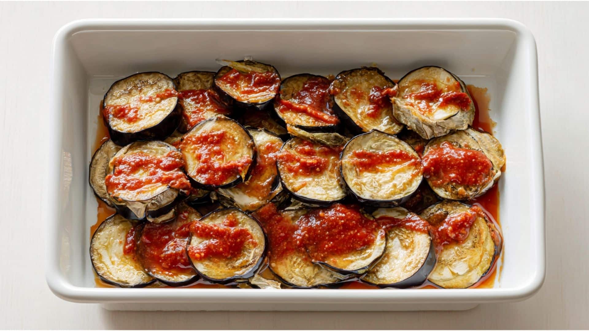 Sliced and roasted Eggplant in layers with sauce (3)