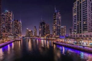 a river running through a city at night