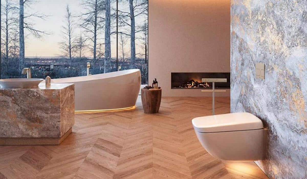 Modern bathroom with freestanding tub and wall-hung toilet