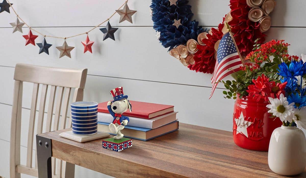 Patriotic Snoopy figurine with American flag and star decorations