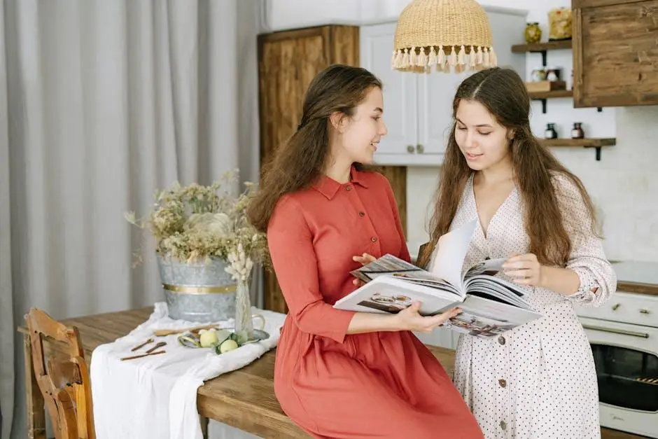 Two women reading a book in a cozy kitchen with wooden shelves and decor