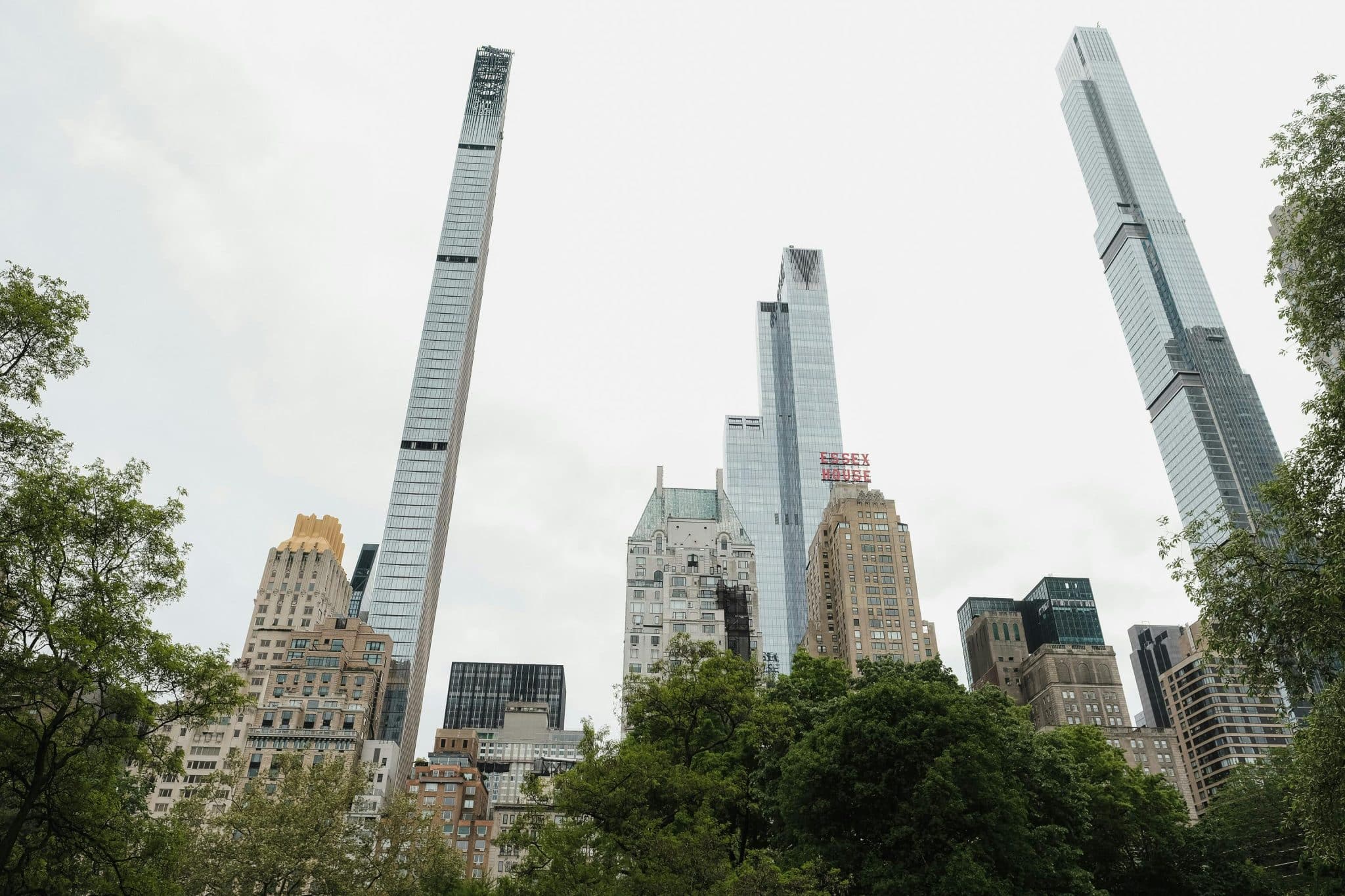 Why is a licensed carrier strictly required by NYC high-rise management?